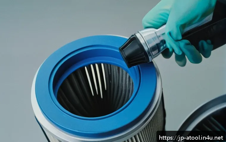 콤프레셔 필터 청소법 - A detailed close-up of a clean industrial air compressor filter being gently brushed with a soft bru...